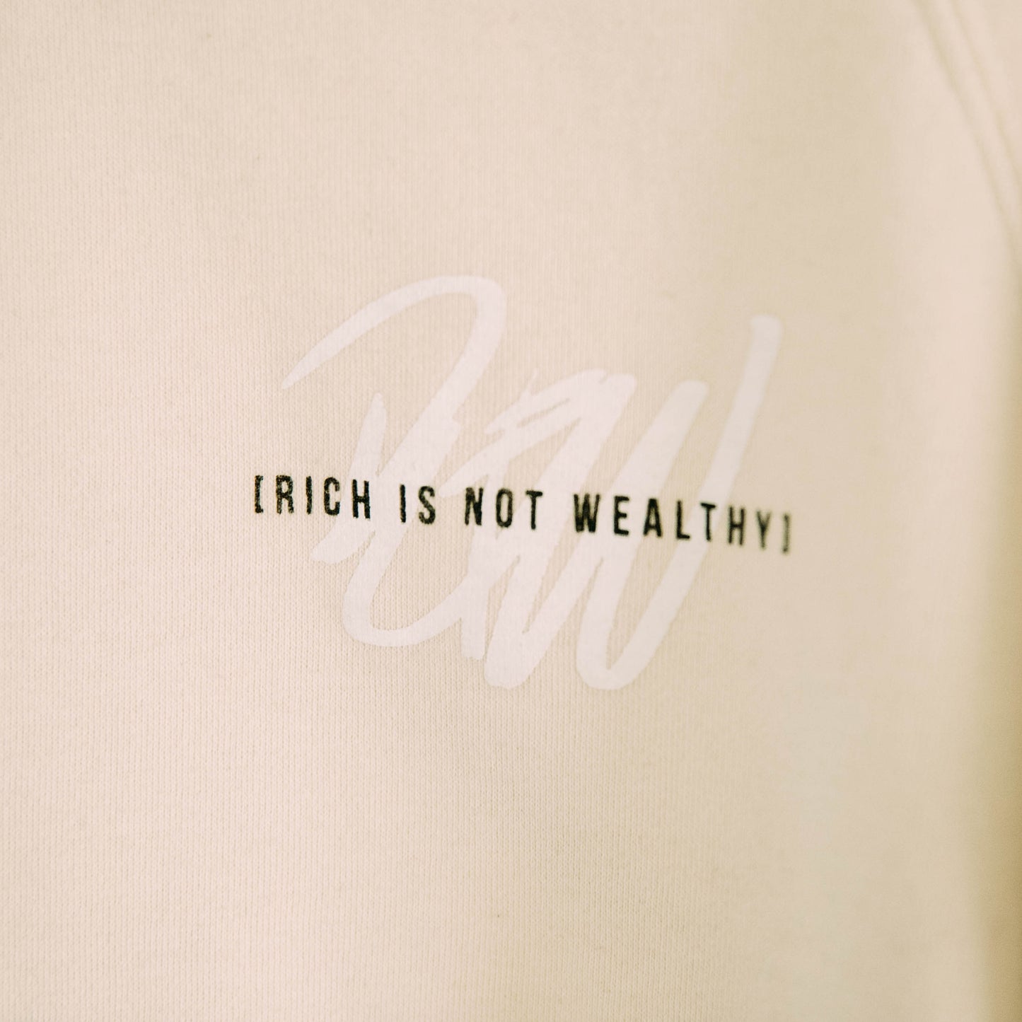Detail shot of the front of the I will live and not die sweatshirt
