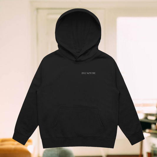 Live Not Die kids hoodie in a living room